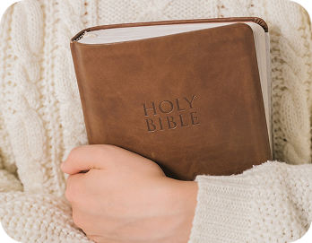 holding a bible